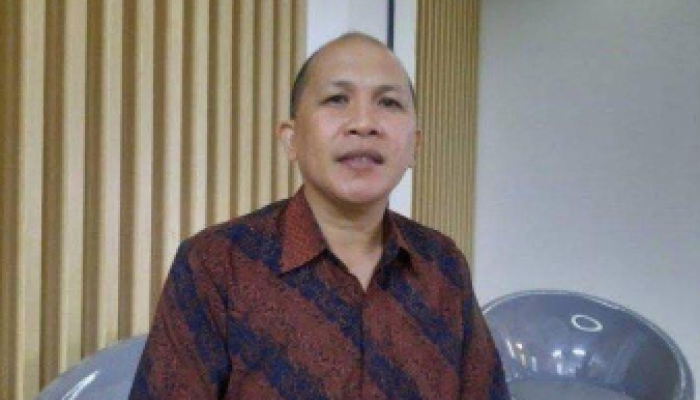 Alfons Kimbal, seorang ahli politik yang berasal dari Sulawesi Utara.